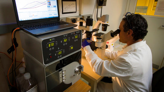 Close-up of laboratory vials and analytical equipment for peptide testing